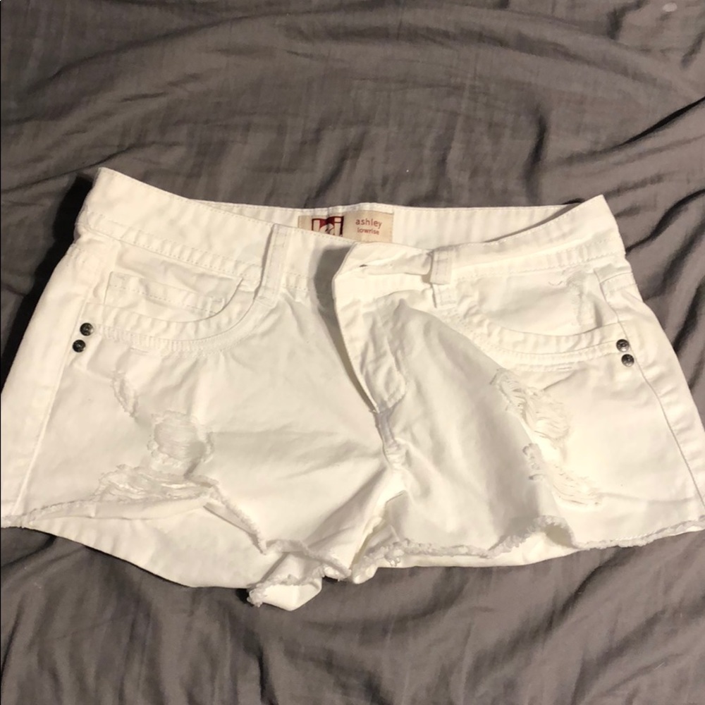 White shorts with holes